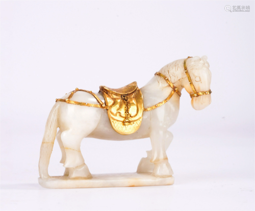 A CHINESE GILT-BRONZE MOUNTED JADE HORSE