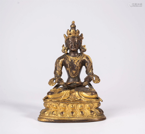 A GILT BRONZE FIGURE OF AMITAYUS