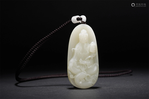 A CHINESE CARVED WHITE JADE GUANYIN PENDANT