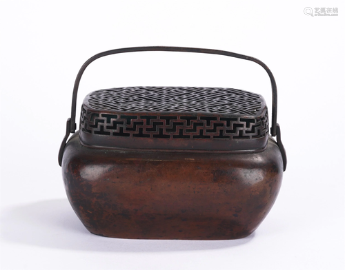 A CHINESE BRONZE HAND-WARMER