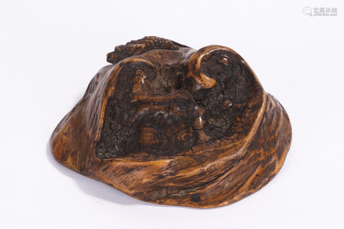 A CHINESE CARVED ALOESWOOD PAPERWEIGHT