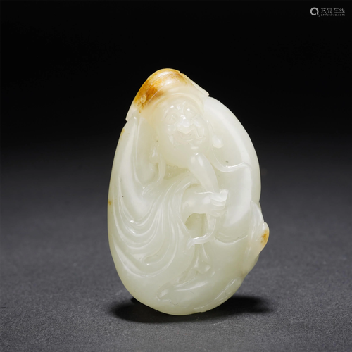 A CHINESE CARVED WHITE JADE FIGURAL PENDANT