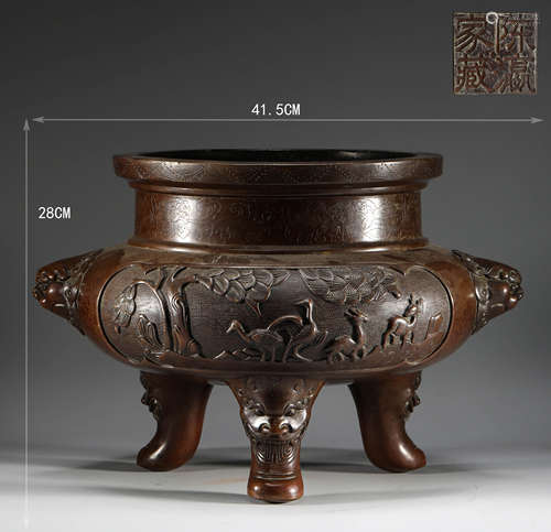 In the Qing Dynasty, copper three legged double ear stove