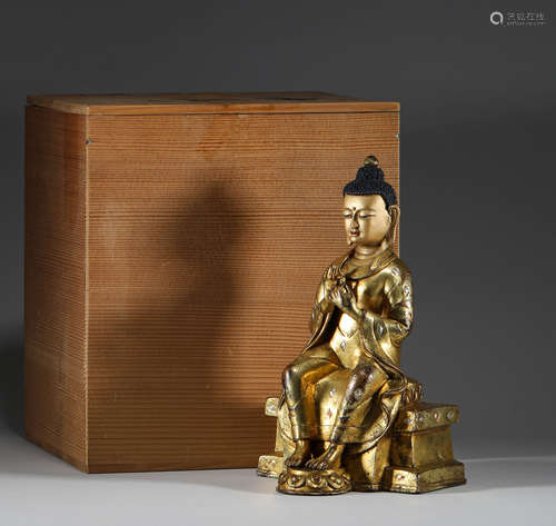 Ming Dynasty, bronze gilded Buddha sitting in Tibet