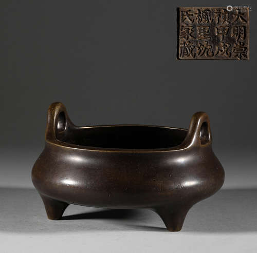 In the Ming Dynasty, the bronze three legged two ear censer