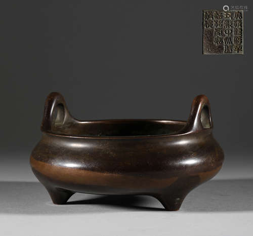 In the Qing Dynasty, the bronze three legged two ear censer