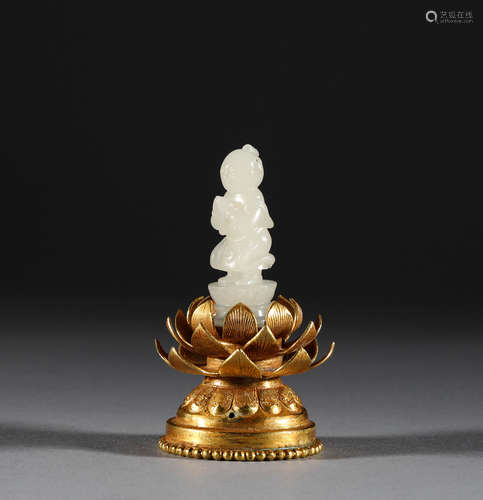 Liao Dynasty. Copper gilt lotus seat, Hotan jade boy