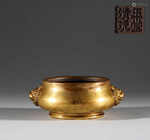 In the Qing Dynasty, the bronze gilded two ear censer