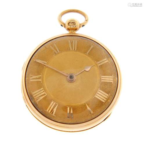 An open face pocket watch.