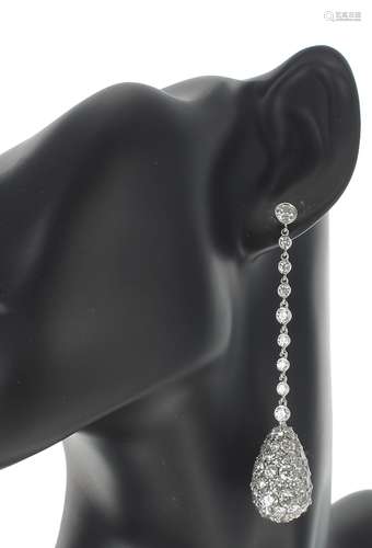 Very fine pair of white gold diamond set pear shaped drop ea...