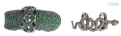 18k white metal green gem set armour ring and an 18k white m...