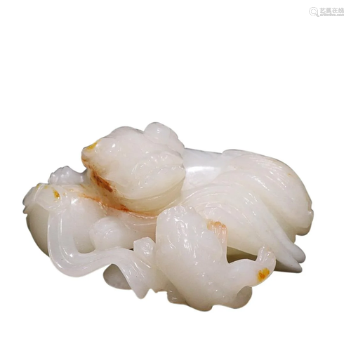 HETIAN JADE 'LION' ORNAMENT