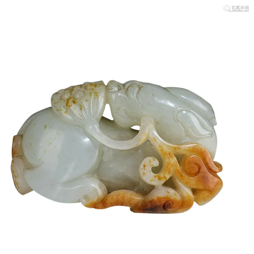 HETIAN JADE 'AUSPICIOUS BEAST' HAND PIECE