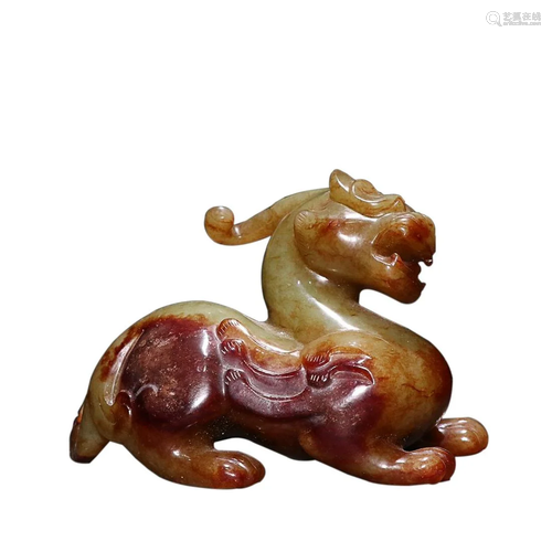 ANTIQUE JADE 'AUSPICIOUS BEAST' ORNAMENT