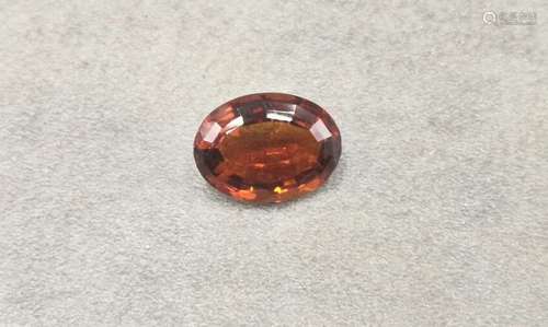 Une topaze madère ovale 15x11mm de 6.40carats EXPERT: Pierre...