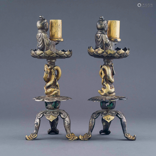 RARE PAIR OF LIAO DYNASTY GILT BRONZE CANDLE STANDS