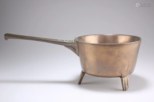 AN 18TH CENTURY BRONZE OR BELL-METAL SKILLET, having a