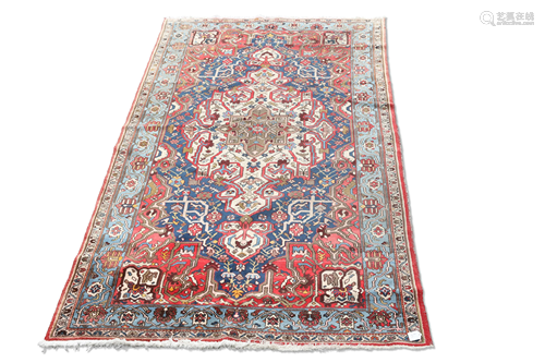 A PERSIAN BAKHTIAR CARPET, CIRCA 1950. 290cm by 166cm