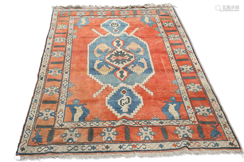 A TURKISH CARPET. 325cm by 315cm