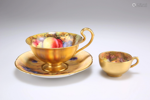 A ROYAL WORCESTER FRUIT PAINTED CUP AND SAUCER, the cup