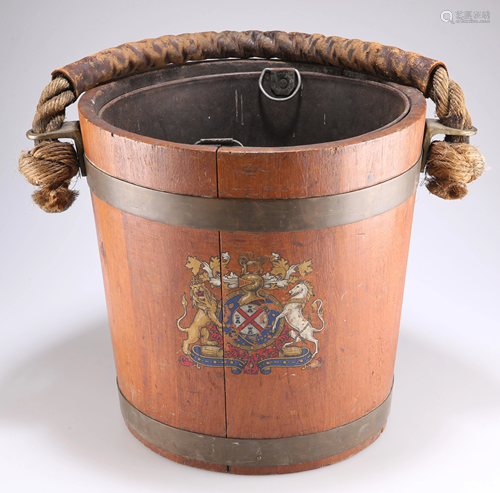 A 19TH CENTURY BRASS-BOUND TEAK FIRE BUCKET, with