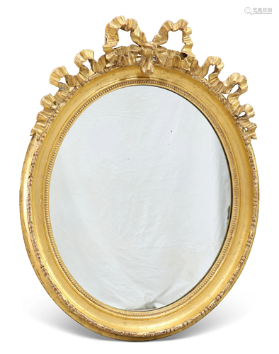 A 19TH CENTURY GILT-GESSO OVAL MIRROR, with ribbon-tied