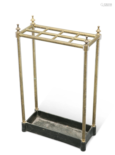 AN EDWARDIAN BRASS AND CAST IRON STICKSTAND, of eight