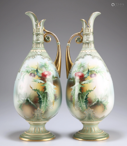 A LARGE PAIR OF PORCELAIN EWERS, CIRCA 1900, each with