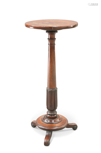 A REGENCY MAHOGANY TORCHÉRE STAND, the circular top