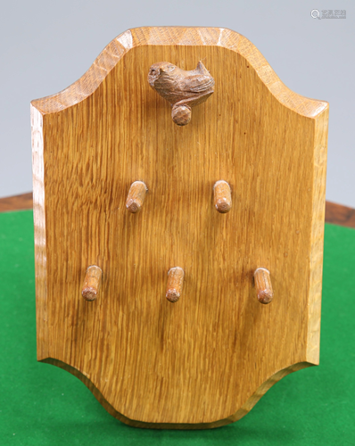 BOB HUNTER, A WRENMAN OAK KEY RACK, with five pegs and