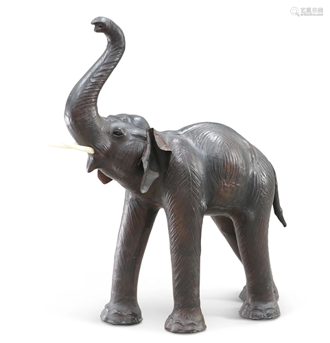 A LARGE VINTAGE LEATHER MODEL OF AN ELEPHANT, modelled