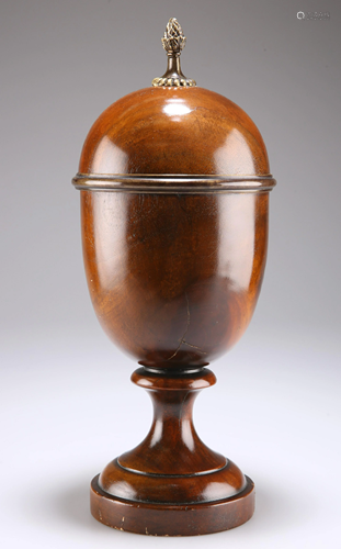 A GEORGE III STYLE MAHOGANY URN-SHAPED BOX, the…