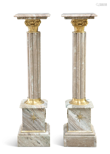 A PAIR OF GILT-METAL MOUNTED MARBLE TORCHÉRE STAN…