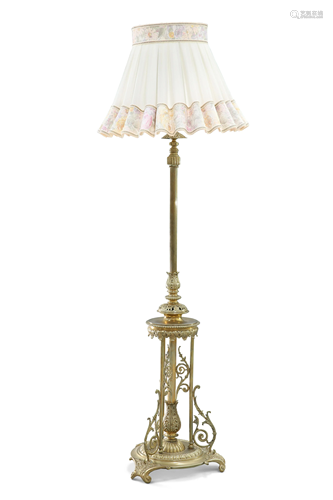 A BRASS TELESCOPIC STANDARD LAMP, decorated with