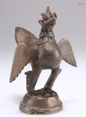 A SMALL BRONZE OF A PHOENIX, cast with wings