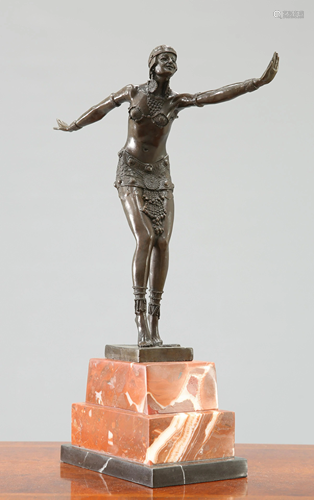 AN ART DECO STYLE BRONZE FIGURE OF A DANCER, the