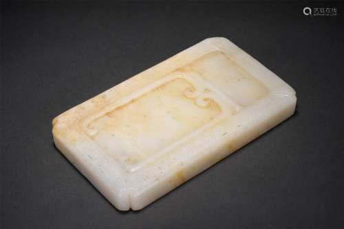 A CHINESE CARVED JADE INK-STONE