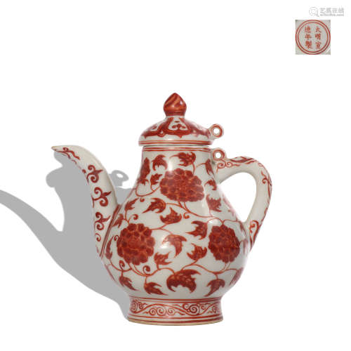 A copper-red-glazed 'floral' winepot