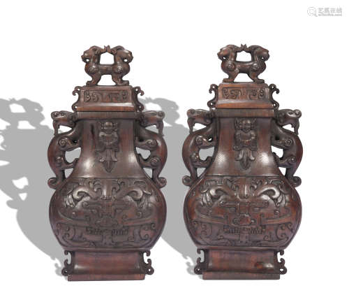 A pair of wood vase