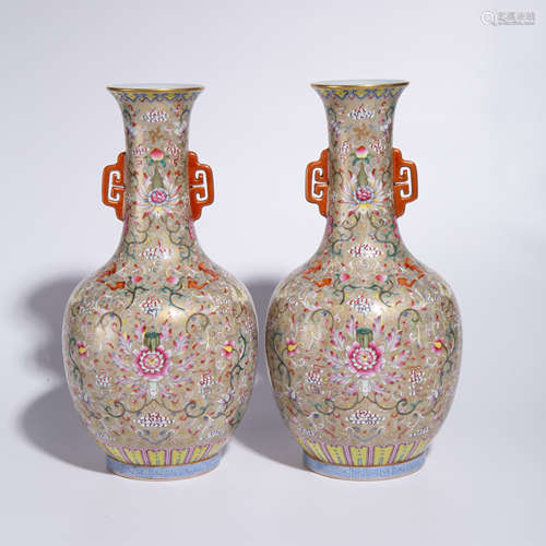 A pair of Qing Qianlong pastel two ear bottles