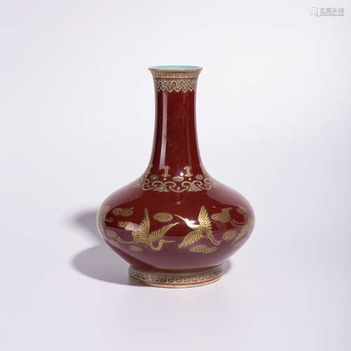 Qing Qianlong gold colored bottle with red background