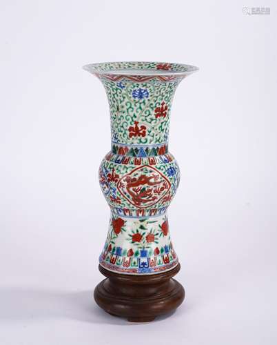 A CHINESE FAMILLE VERTE DRAGONS BEAKER VASE GU