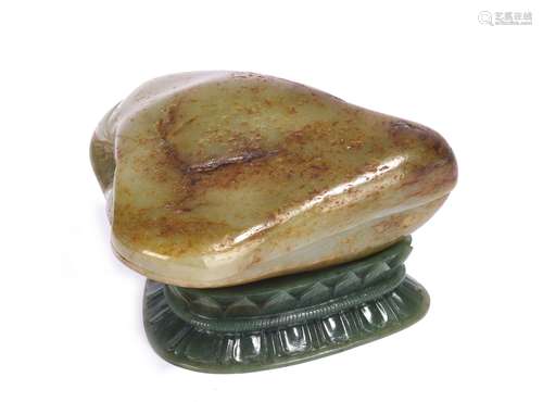 A CHINESE JADE TRIANGLE BOX AND COVER