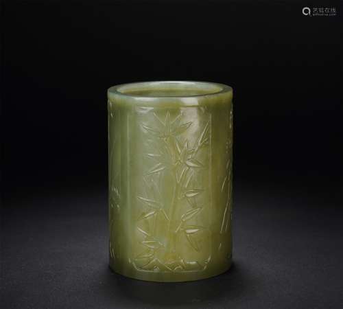 A CHINESE CARVED CELADON JADE BRUSH-POT