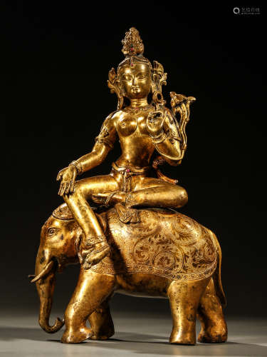 Qing dynasty，a Gilt bronze statue of a riding elephant