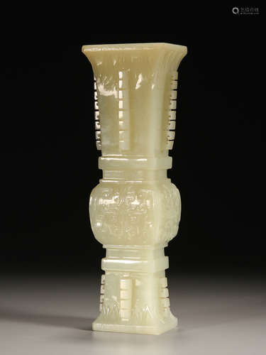 Hetian jade imitation bronze vase with flower design in Qing...