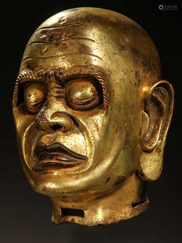 Gilded with bronze head of the Buddha