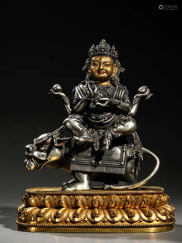 Silver figure Buddha on gilt bronze base