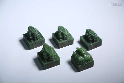 CHINESE GROUP OF SPINACH GREEN JADE DRAGON SEALS WITH SCRIPT