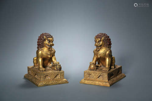 CHINESE PAIR OF GILT BRONZE FIGURES OF LION